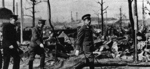 After the firebombing of March 9-10, 1945, Emperor Hirohito toured the ruins of Tokyo nine days later. He was accompanied by his doctor and chamberlain. Three other cars made up the motorcade. Hirohito's aides were shocked by the apparent antipathy displayed to the Emperor. With 100,000 dead and 16 square miles (41 square kilometers) burned out, the public was in no mood to display fealty to their monarch. Observers wondered if Hirohito would announce Japan's surrender but instead he pushed for the defense of Okinawa.